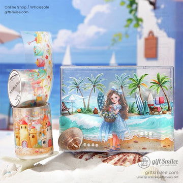 A washi tape set featuring a vivid beach illustration with a girl holding flowers by the seaside, surrounded by tropical trees and shells.