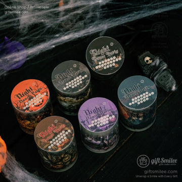 Set of Halloween-themed washi tapes with pumpkins and spooky designs on a dark background