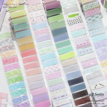 A vibrant pastel washi tape set displayed in rows, featuring various colorful and geometric designs