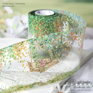 Decorative washi tape with a swing surrounded by ivy and green foliage