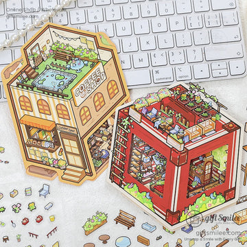 A charming 3D miniature coffee shop sticker set displayed on a keyboard with intricate details.