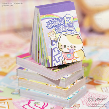 Stack of cat-themed maze puzzle pads with colorful covers.
