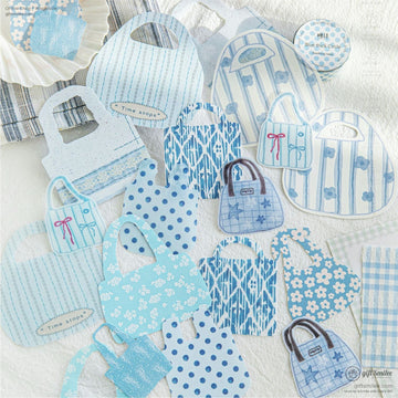 A collection of blue and white mini tote bag stickers with floral and striped patterns, perfect for journaling and scrapbooking