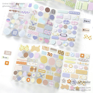 Sheet of pastel gingham and plaid decorative stickers in various shapes for journaling