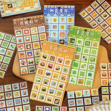 A colorful set of mini stamp stickers featuring food, animals, and nature-themed designs on a wooden table