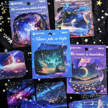 A collection of celestial-themed sticker packs featuring constellations, galaxies, and moons on a cosmic background