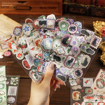 A collection of vintage cat and floral-themed stickers with intricate details, perfect for journaling and crafting
