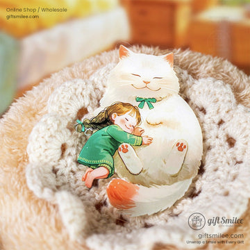 A cozy white cat with a green ribbon cuddling with a little girl in a knitted blanket