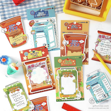 Close-up of Kawaii Japanese snack-themed sticky notes featuring pudding and milk carton designs