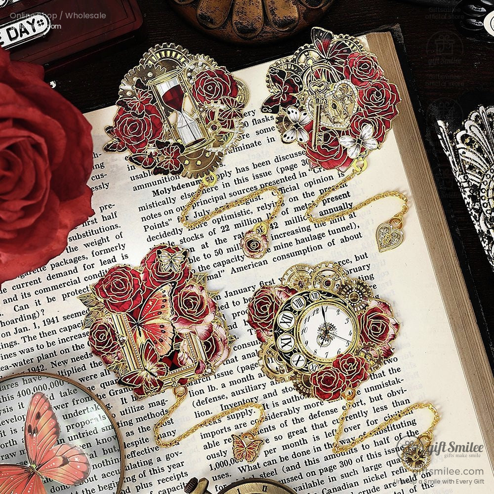 Close-up of red rose brooches featuring hourglass, clock, and butterfly designs