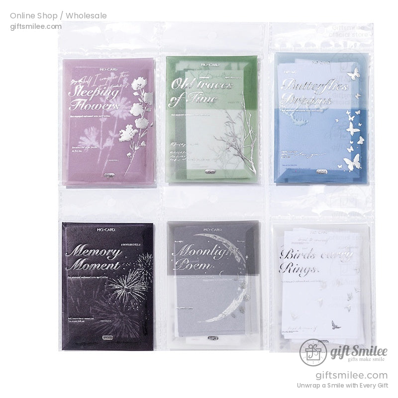 Six packaged sets of nature and moon-inspired stationery with silver foil accents, including themes like Moonlight Poem and Sleeping Flowers