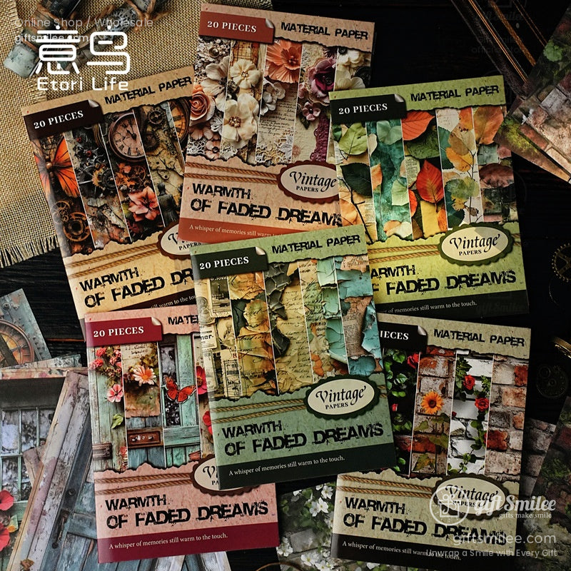 A bundle of Faded Dreams material paper packs with intricate floral and retro patterns for journaling and crafts