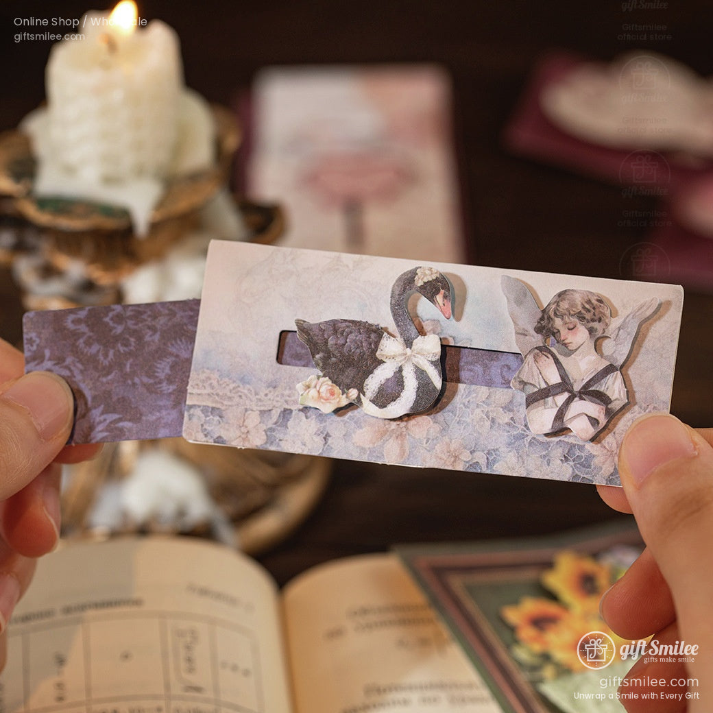 Detailed view of a vintage-style swan and angel-themed ephemera, perfect for journaling or scrapbooking