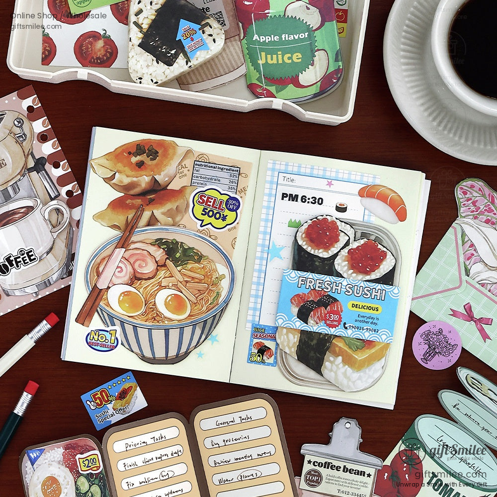 Open journal pages decorated with sushi and ramen stickers alongside notebooks and pens, showcasing creative planner ideas