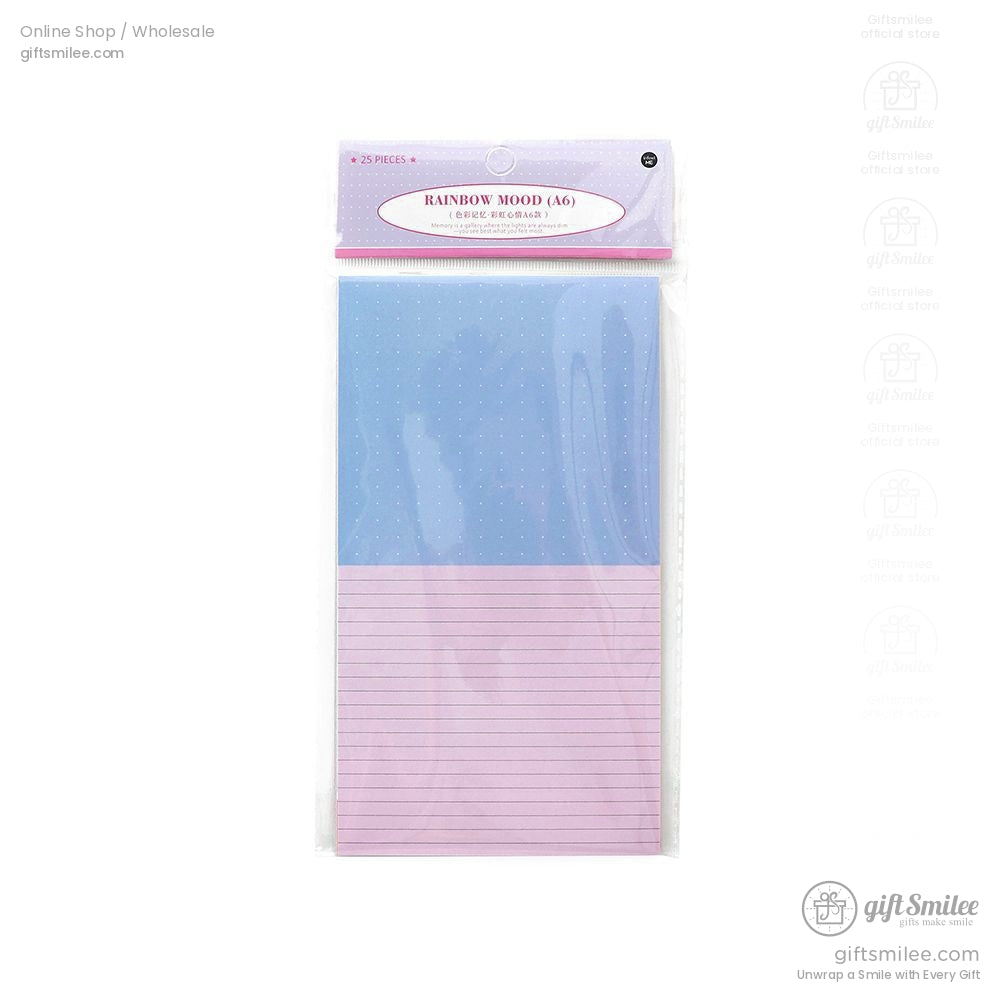 Close-up of packaged pastel and dotted journaling paper sheets