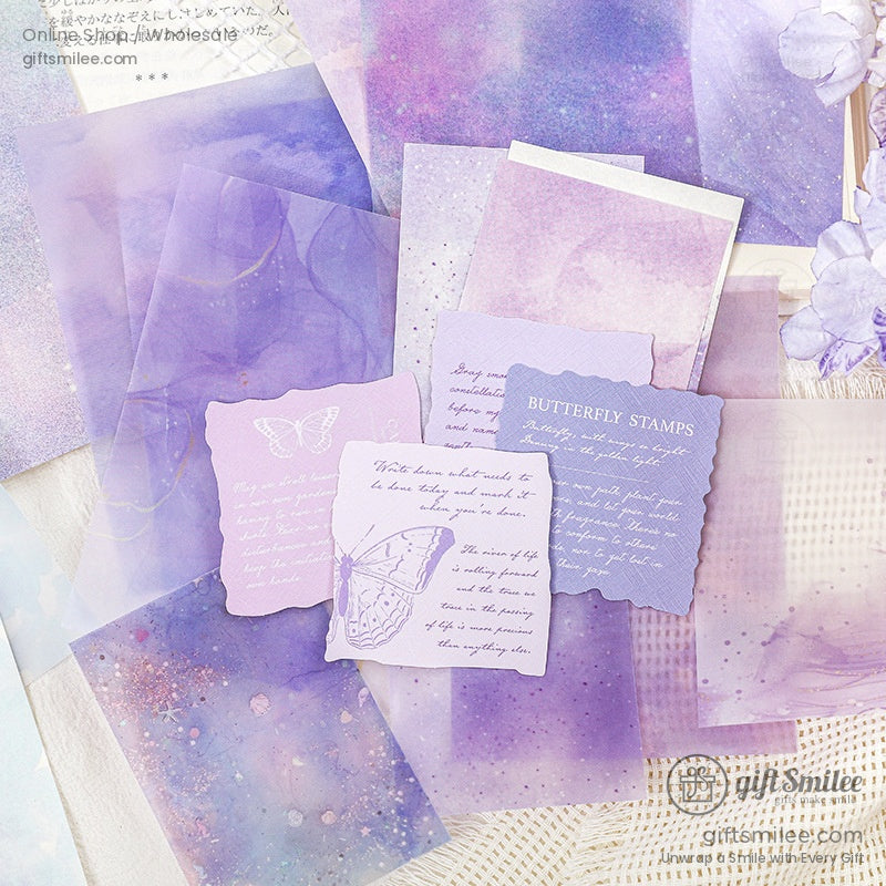 Purple-themed watercolor craft paper with butterfly designs and soft artistic accents
