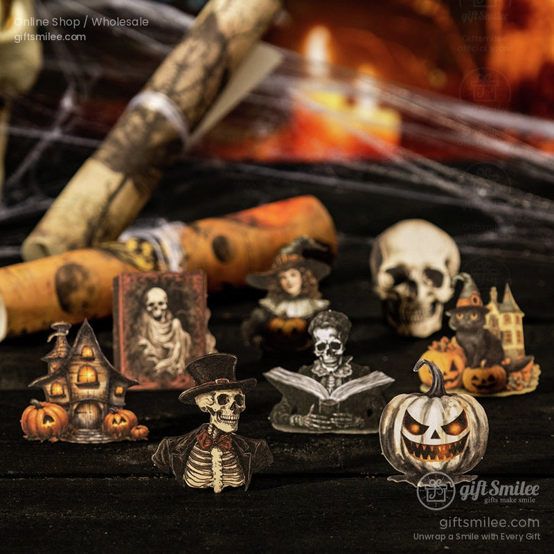 Close-up of vintage Halloween-themed ephemera like skeletons, pumpkins, and haunted houses
