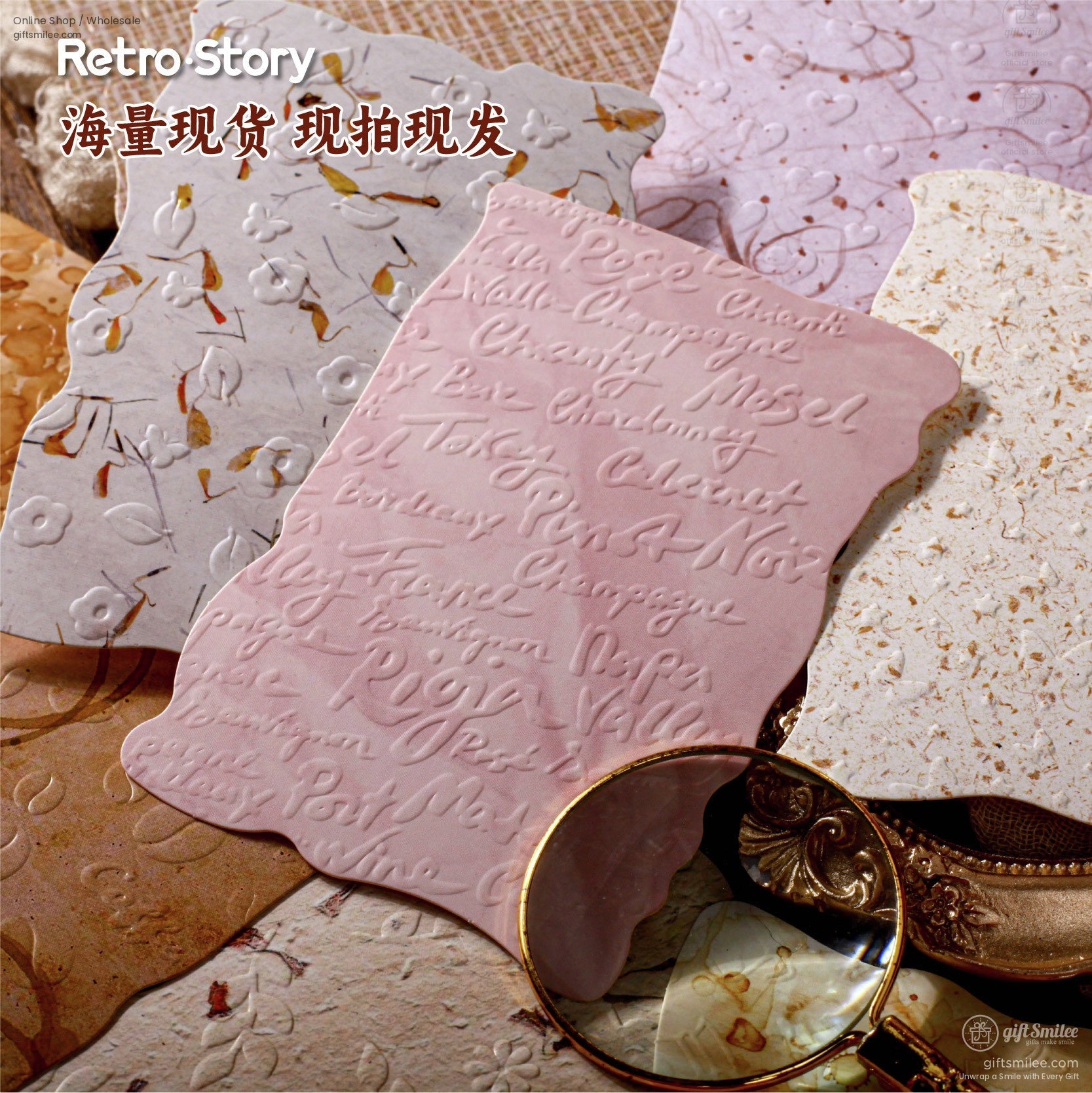 Embossed pink paper with elegant scripts and floral patterns, magnifying glass in view