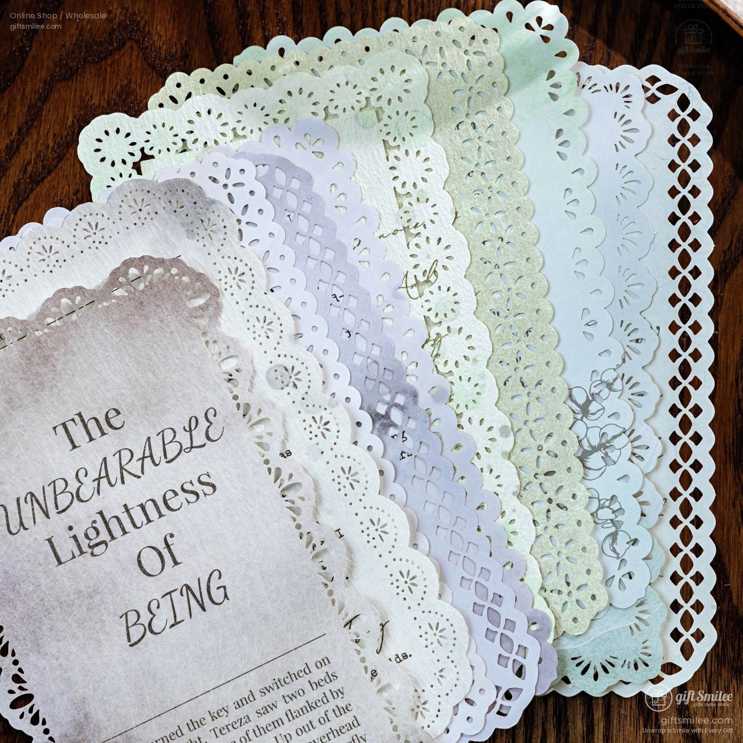 A stack of lace-edged paper cards in various pastel colors, showcasing intricate designs