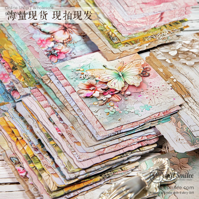 A stack of colorful vintage-style floral and butterfly scrapbook papers