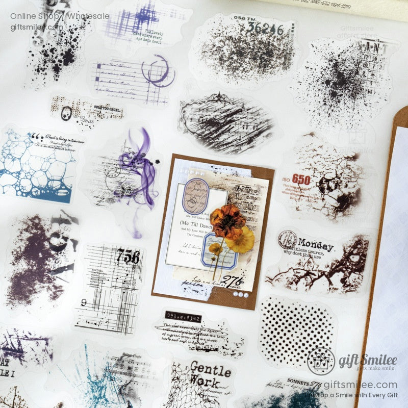 Close-up of assorted grunge-style transparent stickers with textures, numbers, and abstract elements