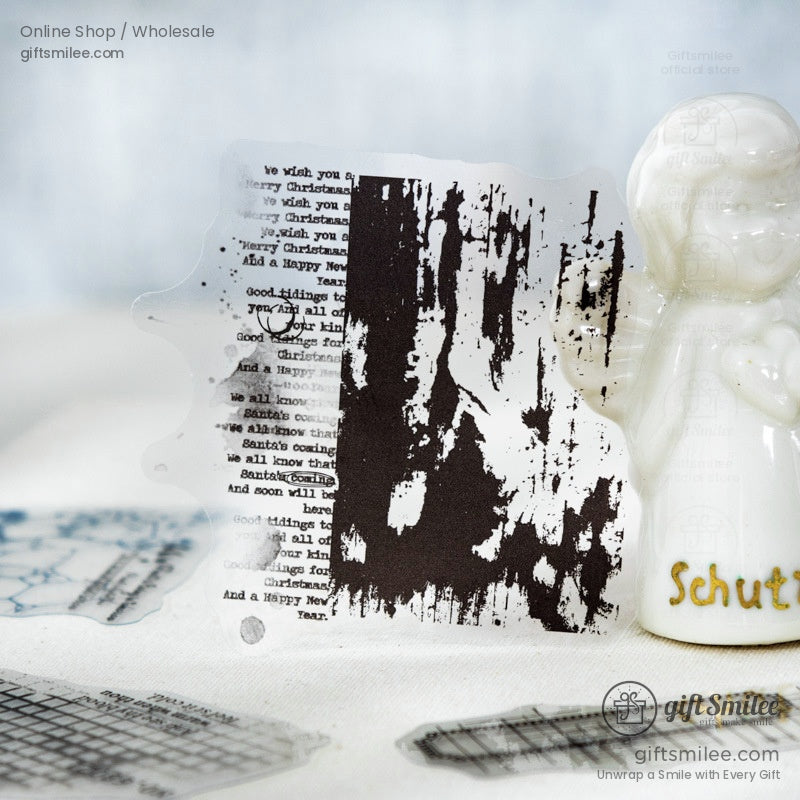 Artistic transparent sticker with a black abstract pattern, displayed alongside a white ceramic figurine