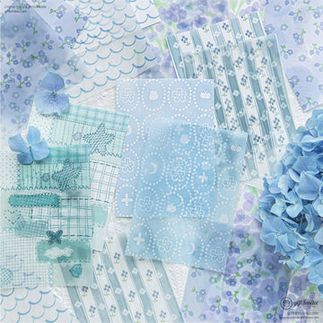A collection of blue floral and hydrangea-themed scrapbook papers with delicate patterns and designs