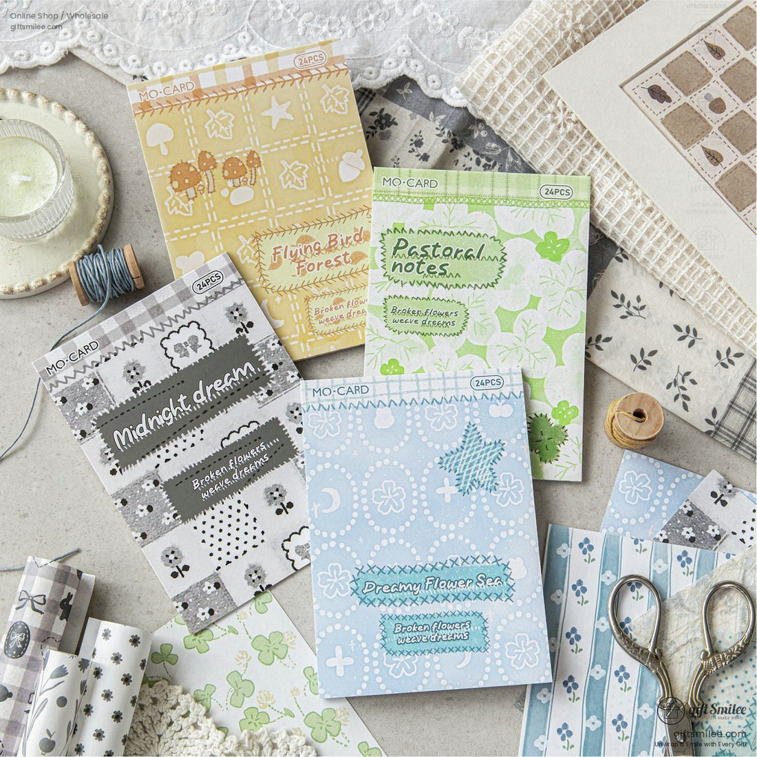A collection of blue floral and hydrangea-themed scrapbook papers with delicate patterns and designs