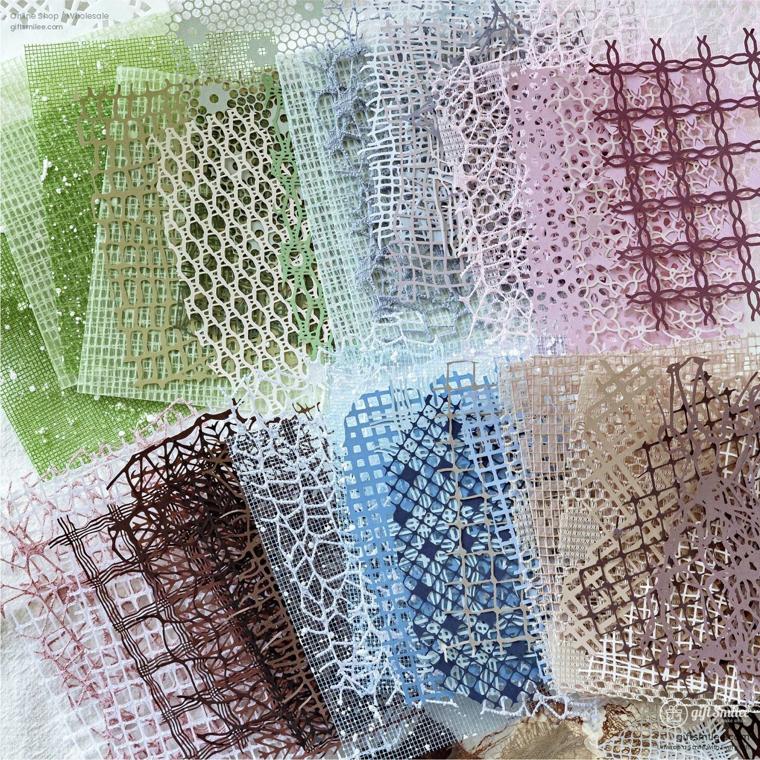 Variety of colorful mesh and lace textures spread out for crafting