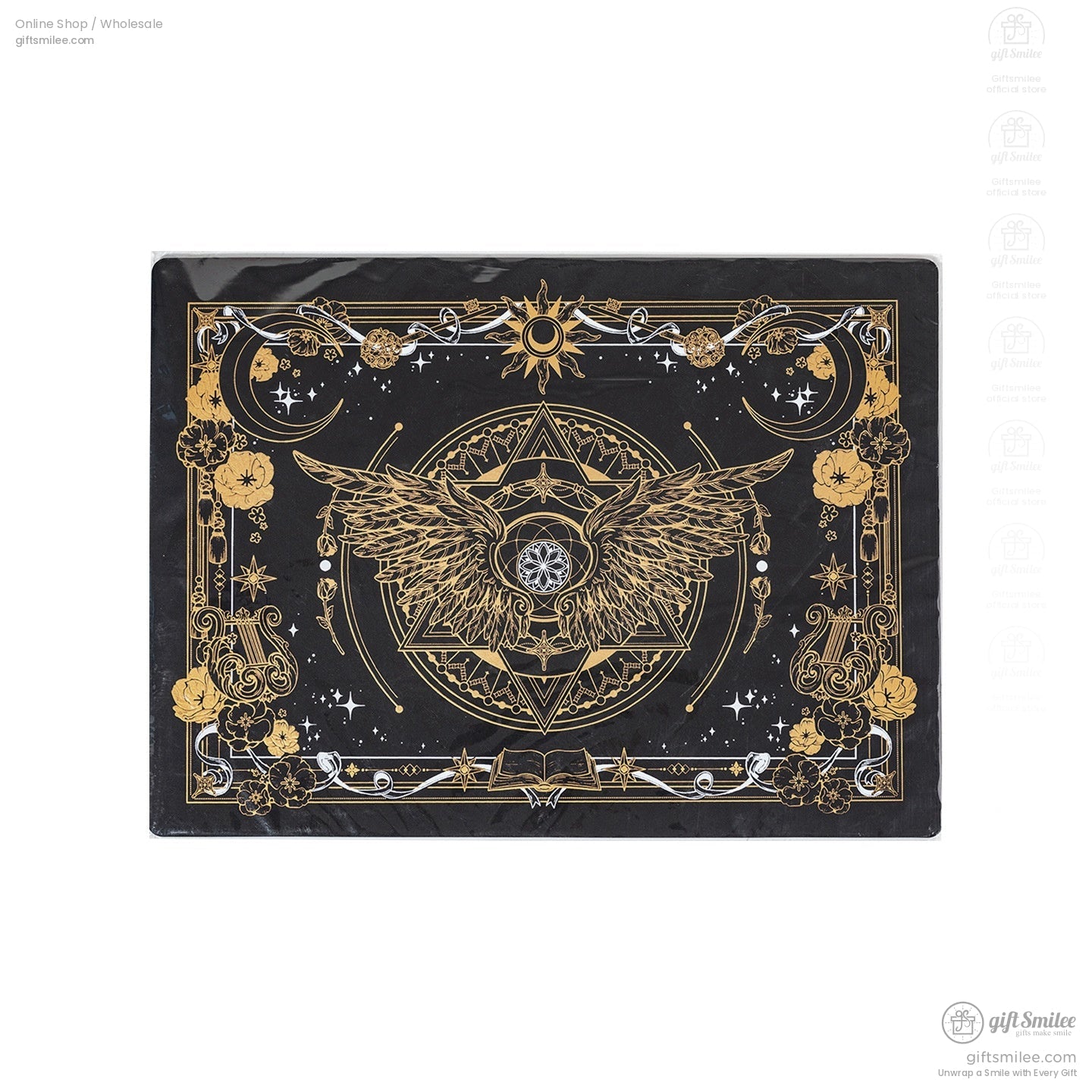 Detailed view of black and gold cutting mat with elegant starry patterns.