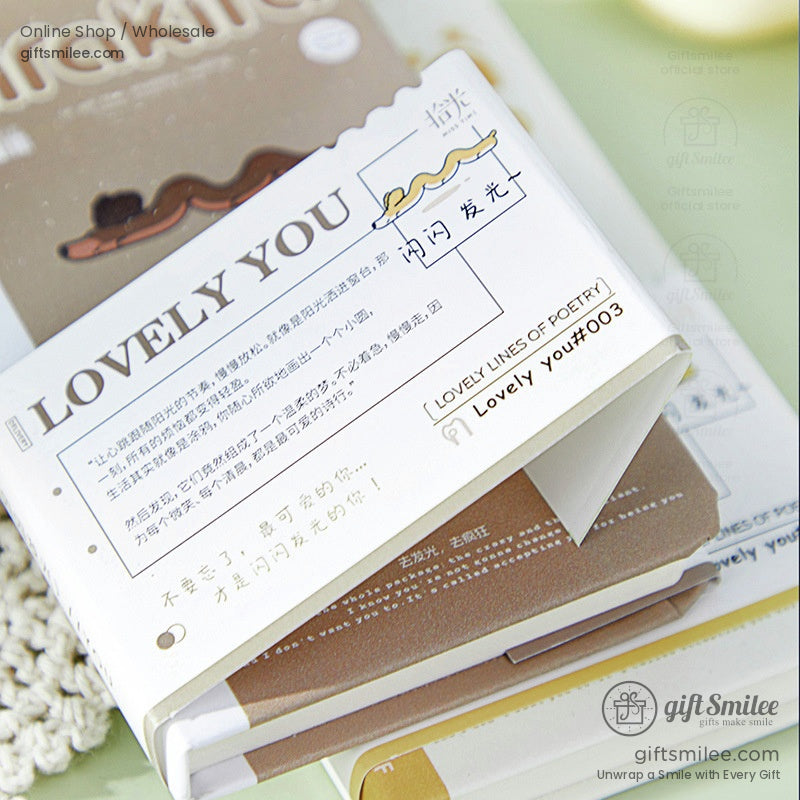 A set of three colorful Kirakira Lovely You journals featuring whimsical illustrations in pastel tones