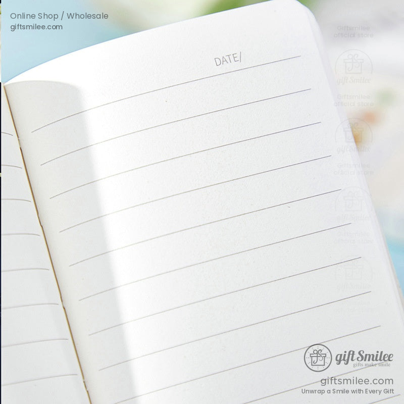 Open notebook with lined pages, ready for writing or planning