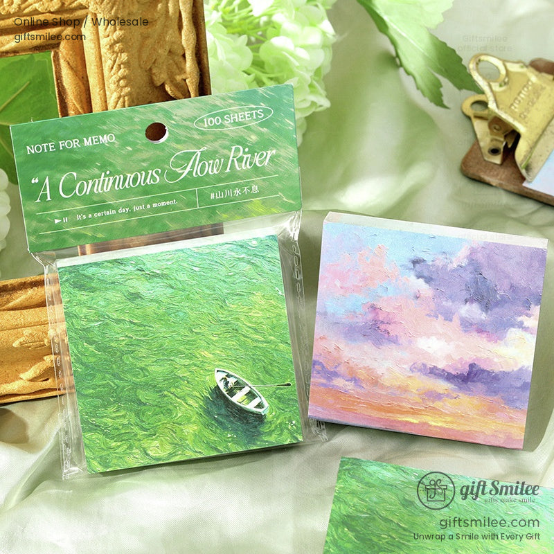 Green river-themed sticky note pad with a small boat design