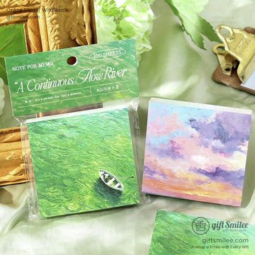 Green river-themed sticky note pad with a small boat design