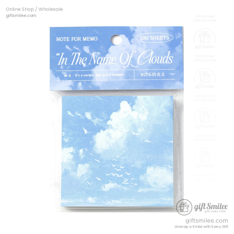 Blue sky and cloud-themed sticky note pad with birds in flight