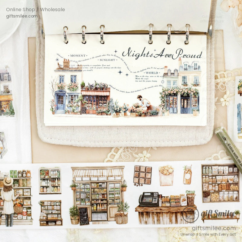 Open journal with vintage washi tape designs used for creative scrapbooking