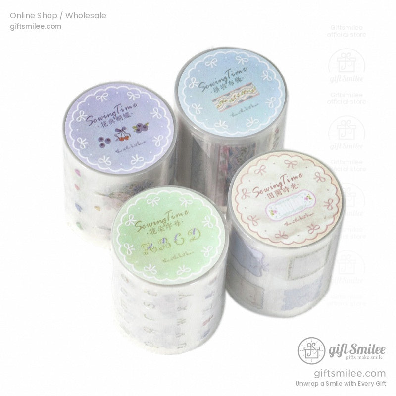 Four rolls of vintage floral washi tape with pastel labels for crafting