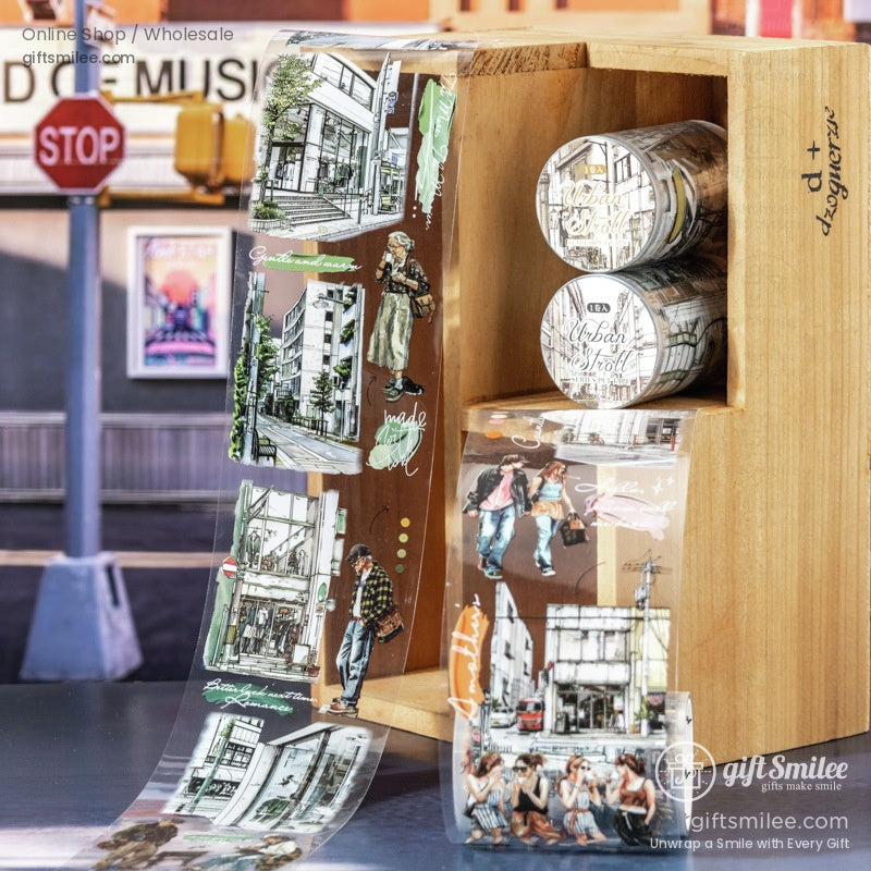 Wooden display box with rolls of Urban Stroll washi tape, surrounded by urban-themed decorative elements.