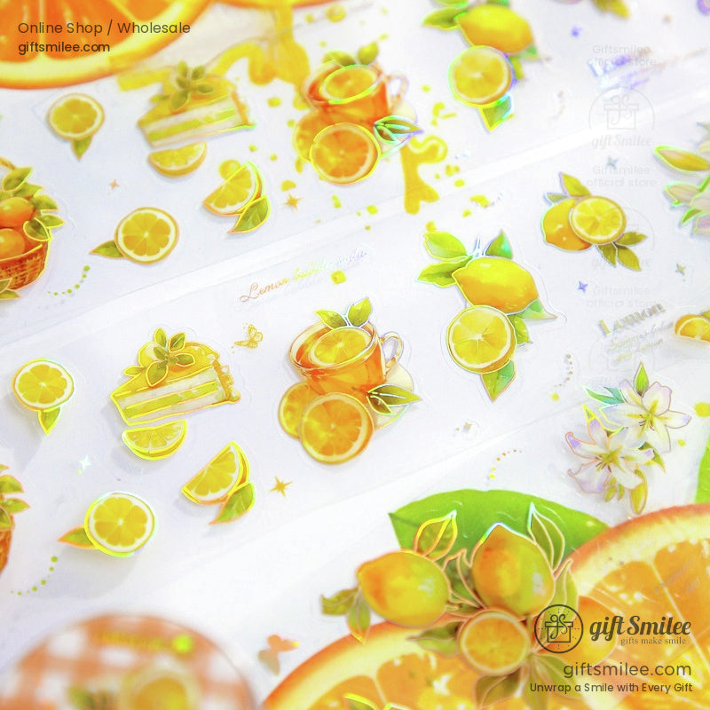 Lemon honey tea-themed washi tape featuring bright yellow lemons and tea motifs on a white background.