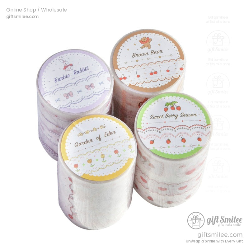 Set of whimsical washi tape rolls featuring floral and strawberry patterns