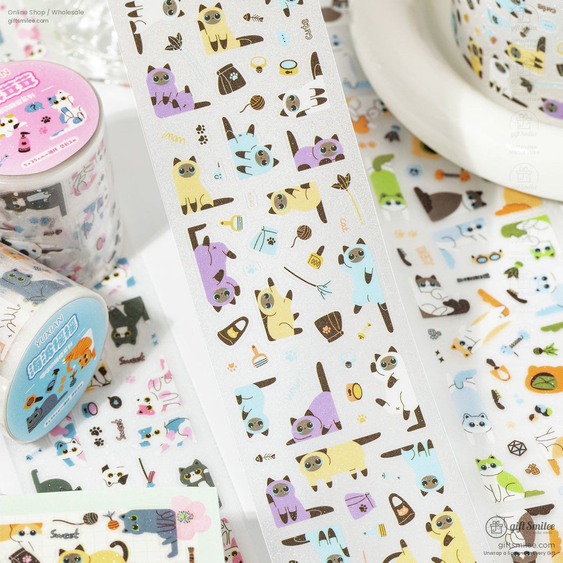 Close-up of washi tape design featuring kawaii cats in pastel colors with playful patterns