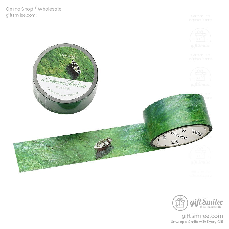 Close-up of green river-themed washi tape roll with a boat design, perfect for crafting