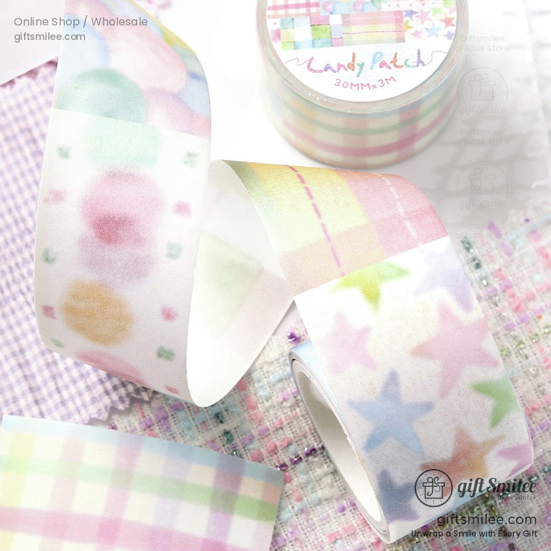 Washi tape roll featuring pastel stars and plaid designs, perfect for journaling and scrapbooking