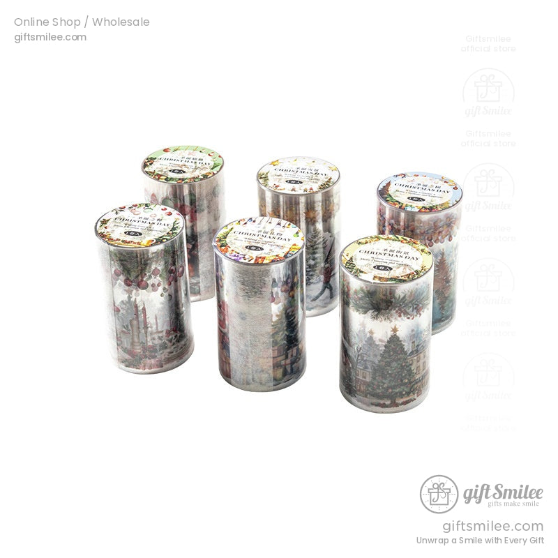 Set of six Christmas washi tape rolls in holiday packaging with festive designs