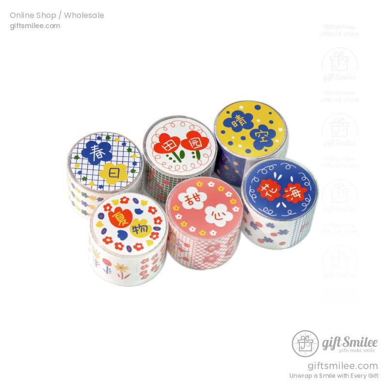 A set of six washi tape rolls with bright patterns, including flowers and geometric designs, on a white background
