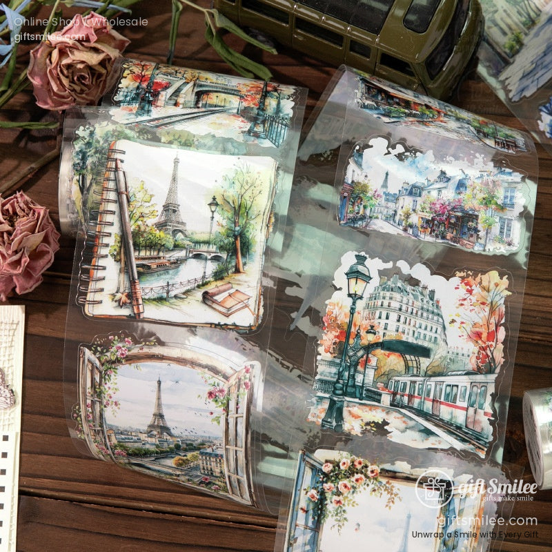 Close-up view of retro scenic washi tape rolls featuring Paris and European landmarks