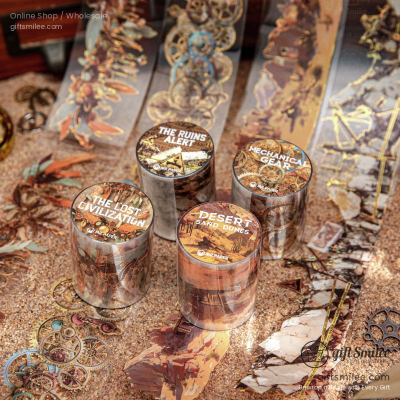 Close-up of steampunk-themed washi tape rolls featuring mechanical gears and vintage designs