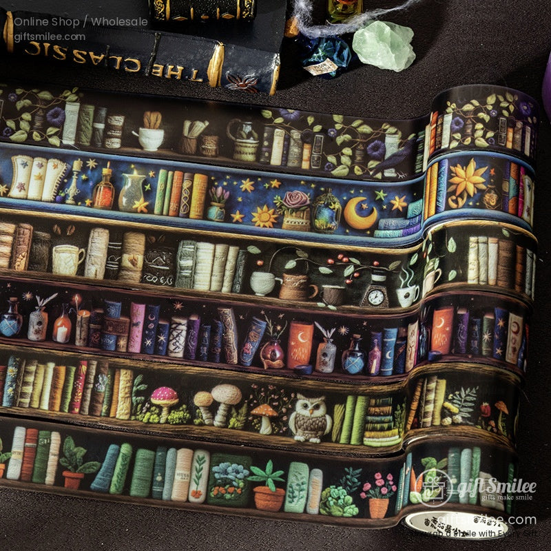 Close-up of the magical bookshelf-themed washi tape roll featuring vintage books, mystical potions, and enchanting designs