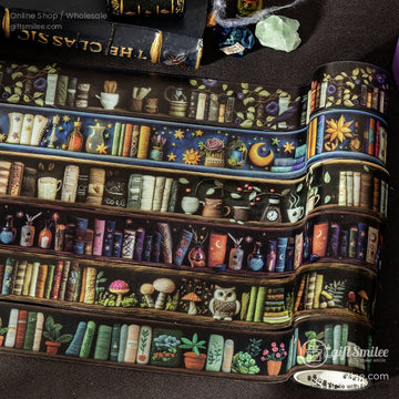 Close-up of the magical bookshelf-themed washi tape roll featuring vintage books, mystical potions, and enchanting designs