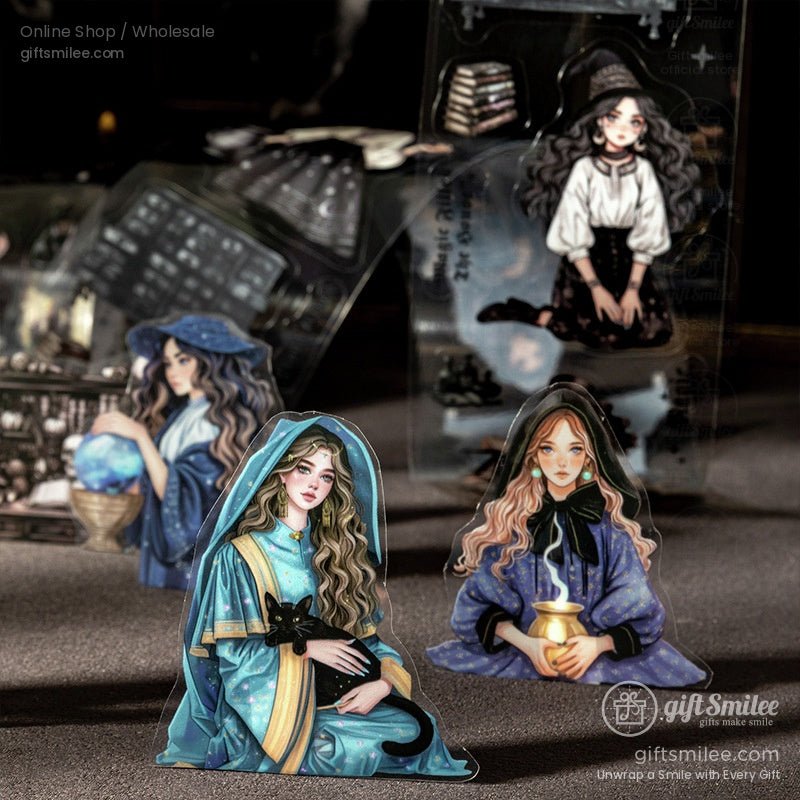 Detailed view of individual witch stickers with vintage outfits, black cats, and magical props